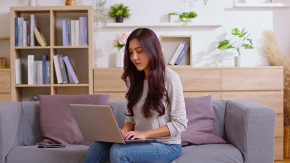 Entrepreneur beautiful business asian young woman wear casual work online with laptop at home.Freela alt