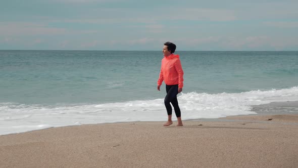 Walking on sandy beach alt