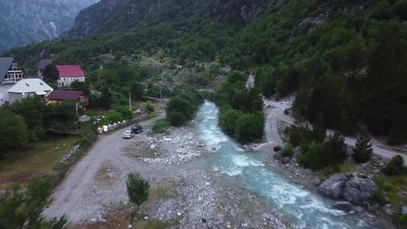 River Water Foaming and Splashing on Cliffs of Alpine Mountains in Theth Albania