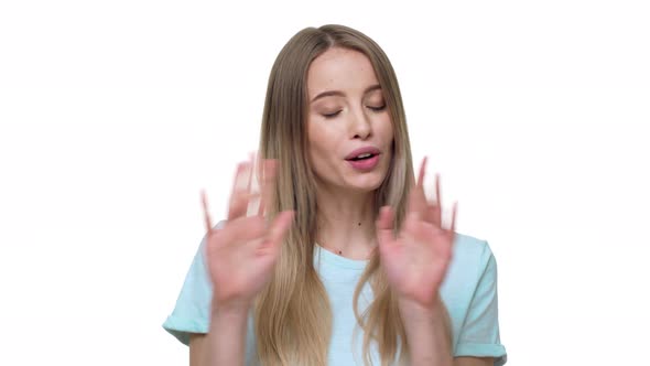 Portrait of Angry Blond Woman Expressing Perplexity and Confusion with Showing Stop Gestures and alt