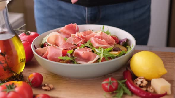 Making Pear Arugula and Blue Cheese Salad at Domestic Kitchen alt