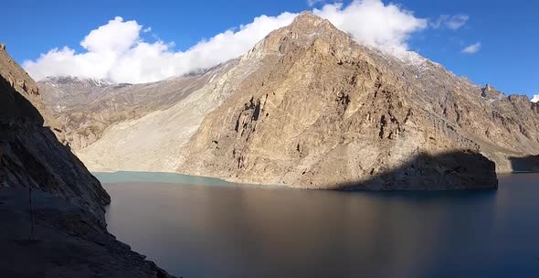 Pan Right Across Of Attabad Lake From Viewpoint On Sunny Clear Day alt