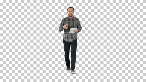 Smiling man with tablet walking and talking, Alpha Channel alt