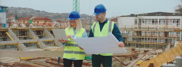 Engineers Checking Blueprints alt