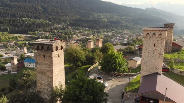 Flying Around of the Famous Historical Svan Towers at Sunset in Mestia Georgia alt
