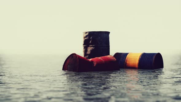 Old Rusty Barrels Oil in Sea Water Illustrates the Pollution of Environment alt
