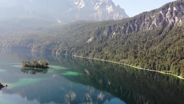 beautiful drone video of an lake and mountains, eibsee in bavaria alt