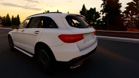 White Luxury SUV Forest Road Sunset View