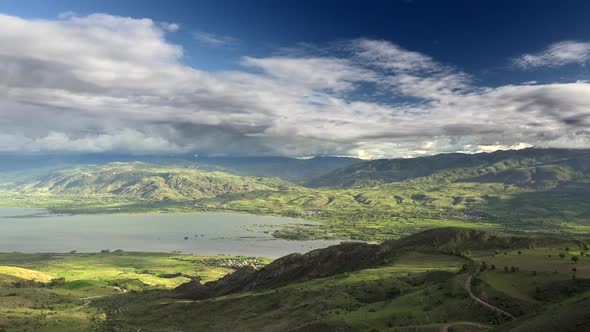 Geography of Lake and Hilly Meadows Landscape alt