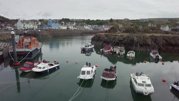 Boats moored in the scotish habour town of Portpatrick Scotland alt