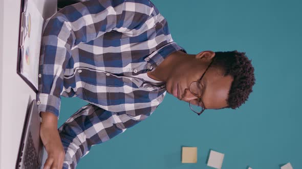 Vertical Video Displeased Analyst Crossing Arms and Showing Disappointment alt