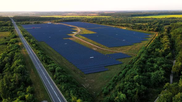 Ecology Solar Power Station Panels in the Fields Green Energy at Sunset Landscape Electrical