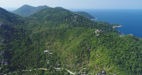 Thailand's Island Aerial Mountains Jungle at Ocean Bay