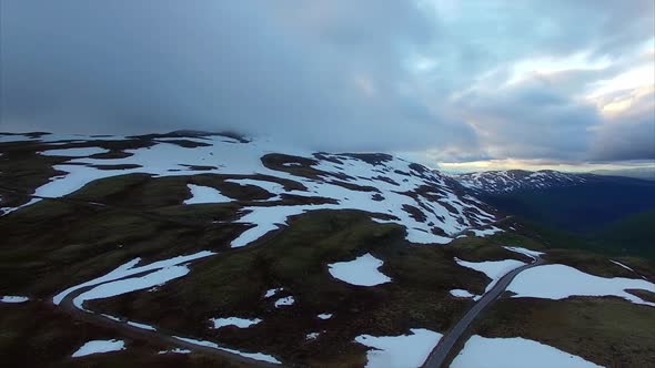 Snowy landscape of national tourist route Aurlandsfjellet in Norway. alt