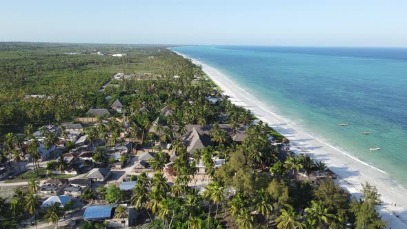 Aerial View of Houses Near the Coast in Zanzibar Tanzania Slow Motion alt