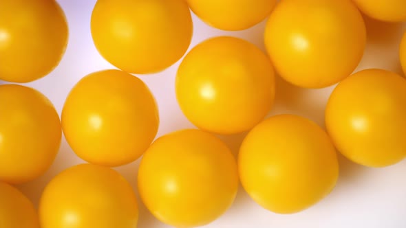 vitamins close-up. round yellow granules vitamin rotate close-up