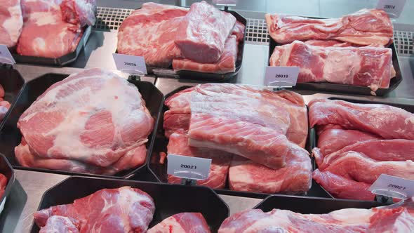 Appetizing Meat Products Are on Display in Special Containers. Meat Products for Sale in a alt