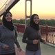 Positive Muslim Women in Hijabs Training Outdoors - VideoHive Item for Sale