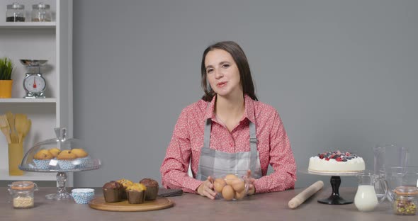 Woman teaching how to prepare delicious desserts