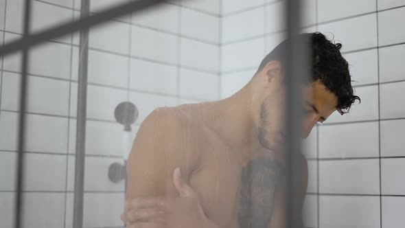 Handsome Tattooed Man Taking Shower Slowmo alt