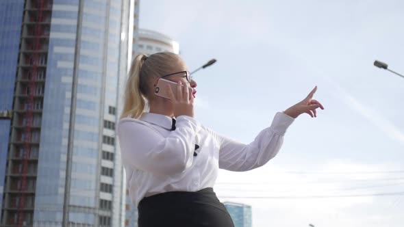 woman talking on the phone on the skyscrapers