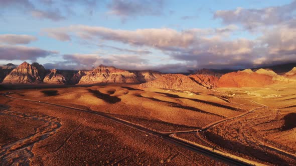 Aerial approach to Red Rock Canyon under Winter Skies in southern Nevada alt