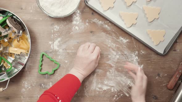 Step by step. Rolling dough. Rolling dough. Holiday season baking. Baking sugar cookies for Christma alt