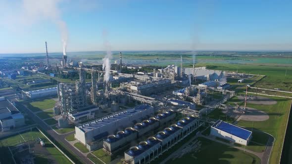 Chemical Plant Produces Gasoline and Mineral Fertilisers. Aerial Flying Morning Sunshine Summer