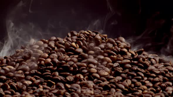 Steam Rising Coffee Beans Heap Close Up alt