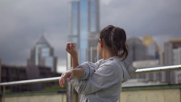 Asian fitness runner sportswomen stretching and preparing in the urban city to run.