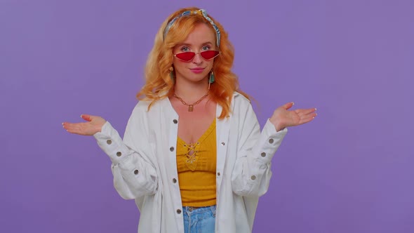 Seductive Cheerful Stylish Girl in White Shirt Wearing Sunglasses Charming Smile on Purple Wall alt