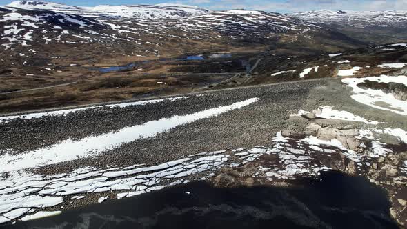 Aerial View Of Sysendammen In The Municipality of Eidfjord in Hordaland, Norway. Dolly Back, Rising alt