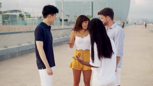 Young Happy Diverse People Multiracial Friends Talking and Chatting During Meeting Outdoors alt