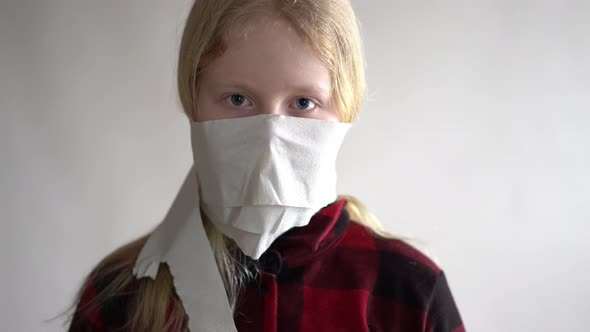 Funny Video - Quarantined Due To an Epidemic of Coronavirus. Girl in a Mask From Toilet Paper Posing