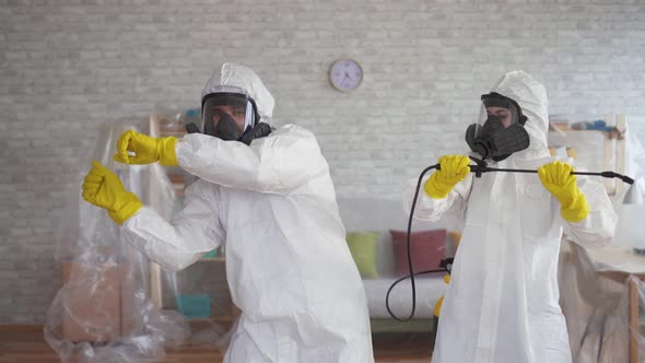 Cleaning Service Workers or Scientists in Protective Overalls Dancing alt