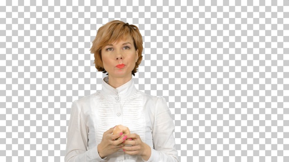 Portrait of young woman eating green apple, Alpha Channel