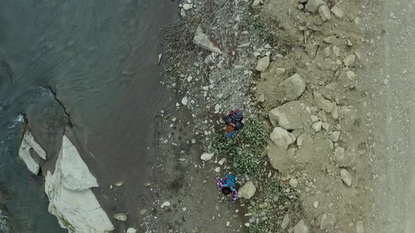 People Walking Mountain River Hiking Rocky Bank Enjoying Adventure Nature Trip alt