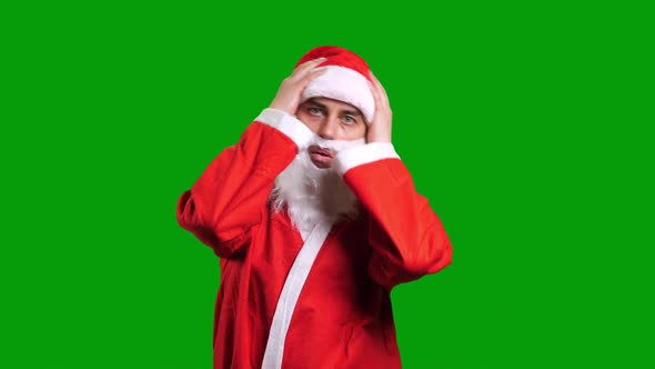 Santa Claus in Red Costume Sad and Shake Head on Green Chroma Key Background alt