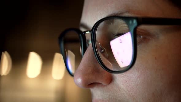 Overtime Work On Laptop.Software Developer Reflection On Glasses.Woman In Glasses Working In Home alt
