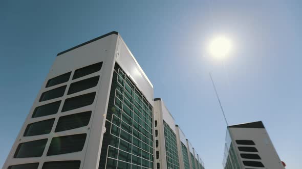 An Air Conditioning System is Located on the Roof of the Business Center alt