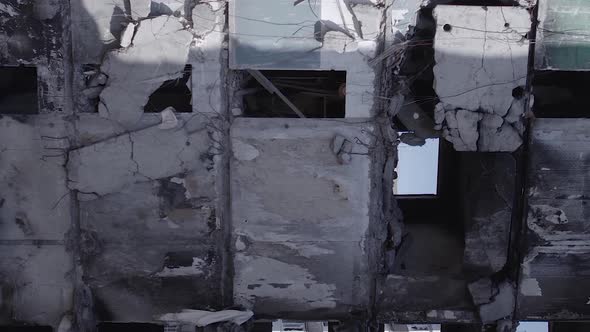 Vertical Video of the Consequences of the War in Ukraine  a Destroyed Building alt