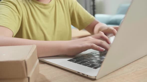 Close Up Of Hand's Young Girl Typing On Computer alt
