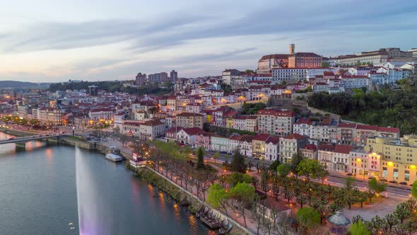 Hyperlapse at sunset of Coimbra city in Portugal with river mondego and fountain alt