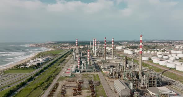 Cinematic view over industrial zone, Galp refinery in Leça da Palmeira, Matosinhos. New Innovation c alt