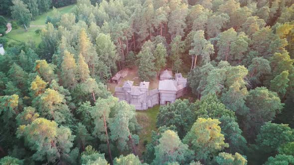 Reconstructed Wooden Castle of Semigallians in Tervete, Latvia Surrounded by Pine Forest alt