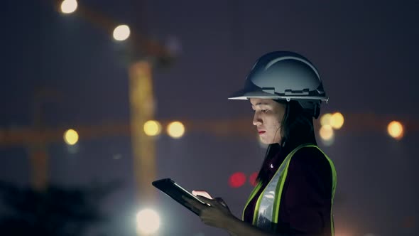 Civil field engineer check and inspection building work on site in night time