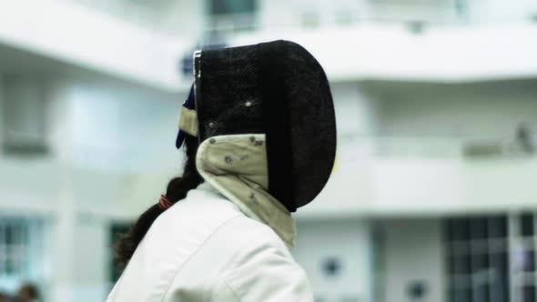 Fencing. Fencer During a Duel. Slow Motion. Kyiv. Ukraine alt