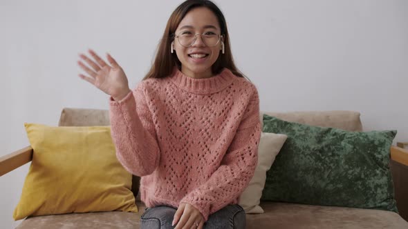 Middle Eastern Young Woman Wears Headset Talks To Web Camera Making Distance Online Video Conference alt