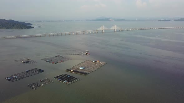 Fish farm in aerial view at Penang alt