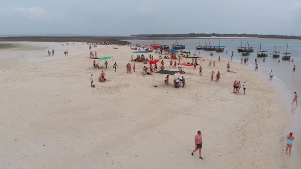 Aerial View Disappearing Island with Tourists and Boats in Menai Bay Zanzibar alt
